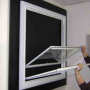 Both panels tilted inwards ready for cleaning on our tilt-back balanced vertical sliding secondary glazing.